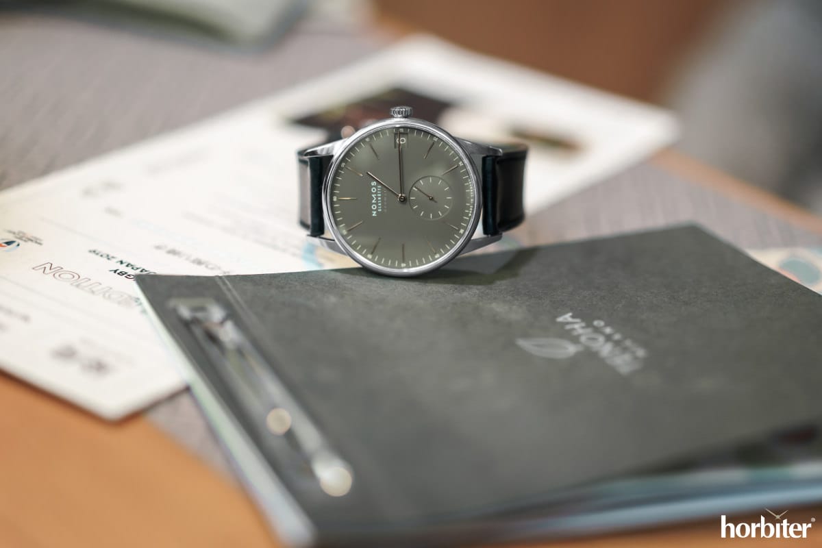 nomos glashuette orion neomatik 41 date olive gold 2